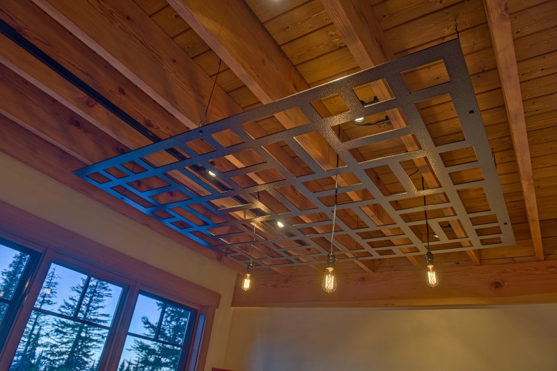 Revamp rustic cabin interior basketweave metal cloud hanging lights close up